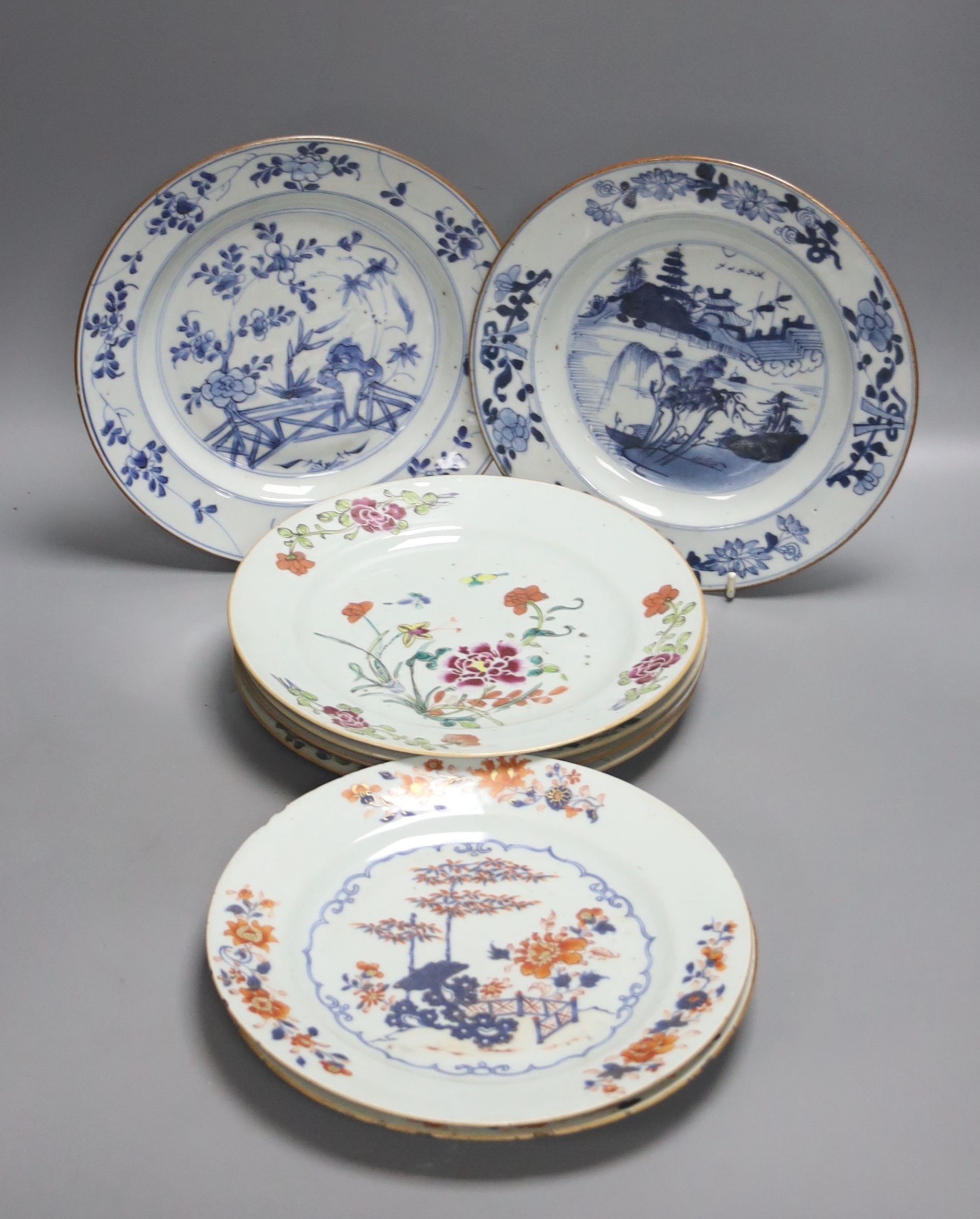 Two 18th century Chinese export blue and white plates, a pair of Chinese Imari patterned plates and four famille rose plates